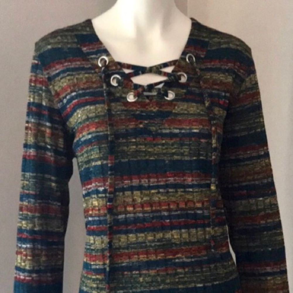 Women’s blue striped long sleeve lace up tunic.